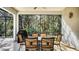 Relaxing screened patio with outdoor dining set and grill at 9506 Royal Calcutta Pl, Lakewood Ranch, FL 34202