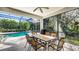 Spacious screened patio overlooking the pool, ideal for outdoor dining at 9506 Royal Calcutta Pl, Lakewood Ranch, FL 34202