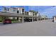 Condominium with carport parking, featuring a secure and covered area for vehicles, providing protection from the elements at 1010 Tidewater Shores Loop # 201, Bradenton, FL 34208