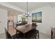 A dining room that is open to the kitchen at 1010 Tidewater Shores Loop # 201, Bradenton, FL 34208