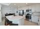 Modern kitchen with island and stainless steel appliances at 1010 Tidewater Shores Loop # 201, Bradenton, FL 34208