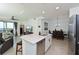 Modern kitchen with island and stainless steel appliances at 1010 Tidewater Shores Loop # 201, Bradenton, FL 34208