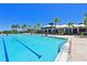 Refreshing community pool with swim lanes and plenty of lounge space at 1010 Tidewater Shores Loop # 201, Bradenton, FL 34208