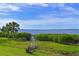Scenic waterfront view with lush greenery at 1010 Tidewater Shores Loop # 201, Bradenton, FL 34208