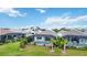 Aerial view of homes with private pools, screened enclosures, and lush landscaping at 10180 Canaveral Cir, Sarasota, FL 34241