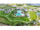 Community features resort-style pool, playground, and tennis courts at 10180 Canaveral Cir, Sarasota, FL 34241