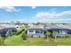 Aerial view of homes showcasing backyard pools and lush landscaping at 10180 Canaveral Cir, Sarasota, FL 34241