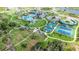 Community features resort-style pool and tennis courts at 10180 Canaveral Cir, Sarasota, FL 34241