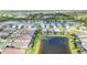Aerial view of luxury homes featuring private pools and lush landscaping at 10180 Canaveral Cir, Sarasota, FL 34241