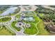 Community features resort-style pool, playground, and tennis courts at 10180 Canaveral Cir, Sarasota, FL 34241