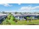 Aerial view of a community featuring homes with private pools and screened enclosures at 10180 Canaveral Cir, Sarasota, FL 34241