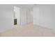Spacious bedroom with access to a private bathroom and ample closet space at 10180 Canaveral Cir, Sarasota, FL 34241