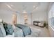 Relaxing main bedroom with a king bed, access to en-suite, and lake view at 10180 Canaveral Cir, Sarasota, FL 34241