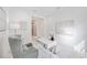 Bright home office with built in shelving and a view of the backyard at 10180 Canaveral Cir, Sarasota, FL 34241