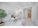 Bright home office with built in shelving and a view of the backyard at 10180 Canaveral Cir, Sarasota, FL 34241
