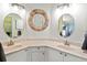 Double vanity bathroom with a large mirror and ample counter space at 1256 Spoonbill Landings Cir, Bradenton, FL 34209