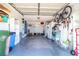 Garage with shelving, storage and bicycle at 1256 Spoonbill Landings Cir, Bradenton, FL 34209