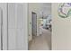 Bright hallway with access to living room and other rooms at 1256 Spoonbill Landings Cir, Bradenton, FL 34209