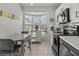 Updated kitchen with stainless steel appliances and breakfast nook at 1256 Spoonbill Landings Cir, Bradenton, FL 34209