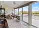 Sunroom with water views and access to deck at 1256 Spoonbill Landings Cir, Bradenton, FL 34209