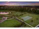 Community features include a pool, playground, basketball court, and walking paths at 13627 American Prairie Pl, Lakewood Ranch, FL 34211