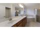 Double vanity bathroom with soaking tub and walk-in shower at 13627 American Prairie Pl, Lakewood Ranch, FL 34211