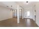 Dining area with contemporary sliding barn doors and tile flooring at 13627 American Prairie Pl, Lakewood Ranch, FL 34211