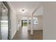Bright and spacious entryway with tile flooring and views to the living room at 13627 American Prairie Pl, Lakewood Ranch, FL 34211