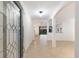 Bright and spacious entryway with view into the living room at 13627 American Prairie Pl, Lakewood Ranch, FL 34211