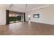 Bright living room with sliding doors to the backyard at 13627 American Prairie Pl, Lakewood Ranch, FL 34211