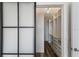 Spacious walk-in closet with ample shelving and drawers at 13627 American Prairie Pl, Lakewood Ranch, FL 34211