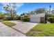 Long driveway leading to a brick house at 1616 North Dr, Sarasota, FL 34239
