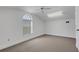 Room featuring window, ceiling fan, and closet at 1616 North Dr, Sarasota, FL 34239