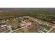 Aerial view of a house and neighborhood, showcasing its location at 16531 Becasse Dr, Punta Gorda, FL 33955