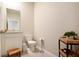 Clean bathroom with toilet, sink, and vanity at 16926 Harvest Moon Way, Bradenton, FL 34211