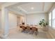 Dining area with a large wooden table and chairs at 16926 Harvest Moon Way, Bradenton, FL 34211