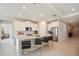 Spacious kitchen boasts granite countertops, stainless steel appliances, and an abundance of cabinet space at 16926 Harvest Moon Way, Bradenton, FL 34211