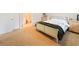Well-lit bedroom with a double bed and dresser at 16926 Harvest Moon Way, Bradenton, FL 34211