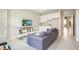 Relaxing living room with sectional sofa, media console and wet bar at 16926 Harvest Moon Way, Bradenton, FL 34211