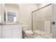 Bathroom with a shower and white vanity at 16926 Harvest Moon Way, Bradenton, FL 34211