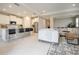 Open concept kitchen with island and living room view at 16926 Harvest Moon Way, Bradenton, FL 34211