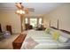 Spacious primary bedroom with large windows and ample natural light at 31730 Clay Gully Rd, Myakka City, FL 34251