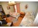 Charming bedroom with two twin beds and wood floors at 31730 Clay Gully Rd, Myakka City, FL 34251