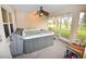 Relaxing hot tub on screened porch at 31730 Clay Gully Rd, Myakka City, FL 34251