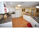 White kitchen with ample counter space and island at 31730 Clay Gully Rd, Myakka City, FL 34251