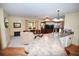 Kitchen with island, breakfast bar, and view of living room at 31730 Clay Gully Rd, Myakka City, FL 34251
