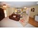 Living room with open concept kitchen and breakfast bar at 31730 Clay Gully Rd, Myakka City, FL 34251