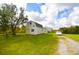 Detached workshop or storage building with a barn style roof at 31730 Clay Gully Rd, Myakka City, FL 34251