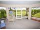 Spacious screened porch overlooking backyard at 31730 Clay Gully Rd, Myakka City, FL 34251