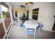 Enjoy outdoor dining in this screened porch with view of the backyard at 31730 Clay Gully Rd, Myakka City, FL 34251
